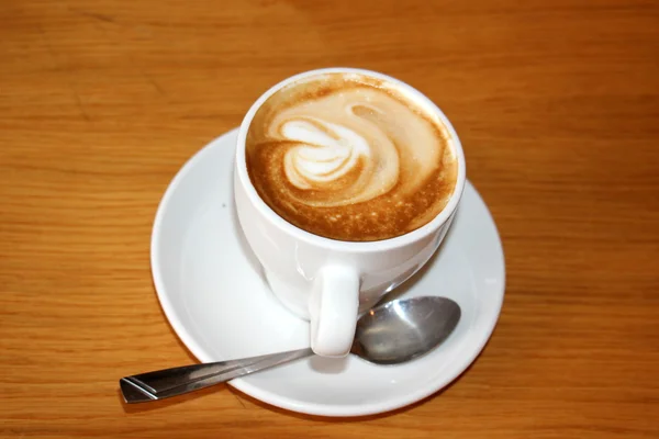 Uma xícara de café e cappuccino — Fotografia de Stock