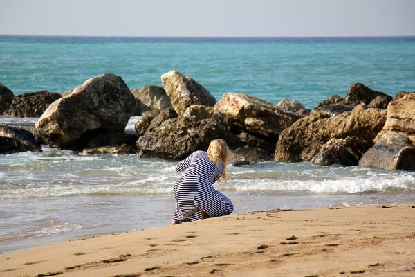 people near the sea