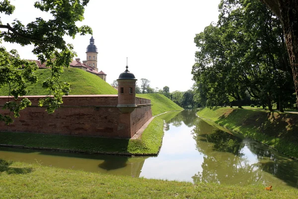 Nesvizh castle on the river Usha — Stock Photo, Image