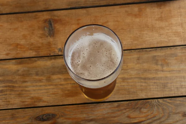 Cerveja em uma caneca — Fotografia de Stock