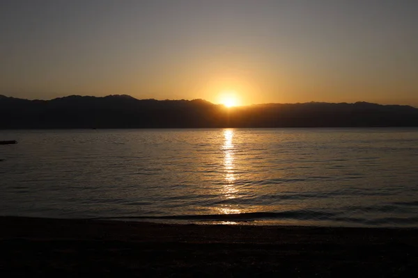 early morning and sunrise on the shores of the Red Sea in southern Israel in Eilat