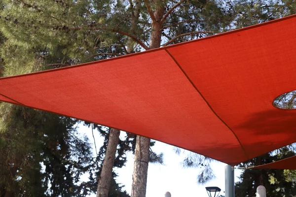 canopy for protection from the sun and outdoor recreation on the shores of the Mediterranean Sea in northern Israel