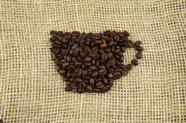 Bir fincan kahve kavrulmuş fasulye