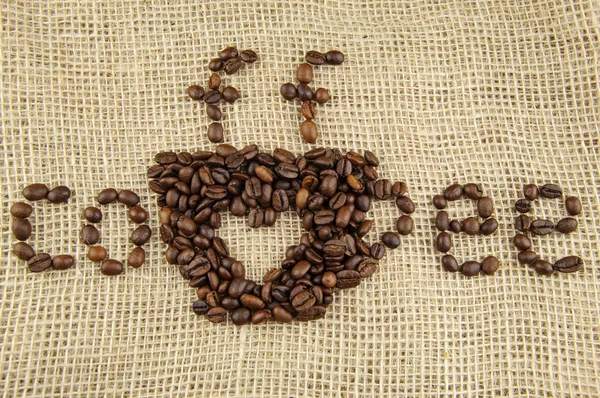 Bir fincan kahve kavrulmuş fasulye