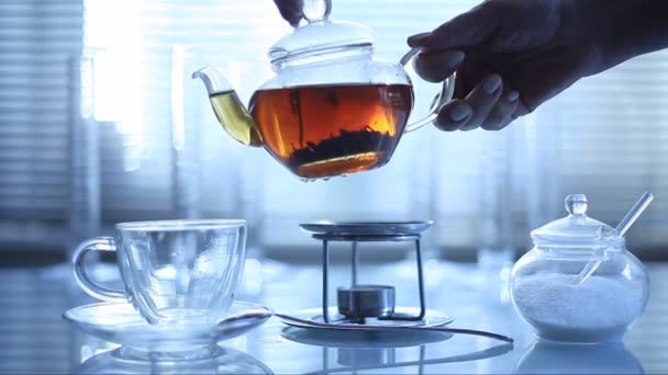 Morning. breakfast. hand pours tea — Stock Video