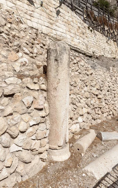 Ruins of Second Temple time street with columns at the site of the Western Wall Excavations near the Temple Mounts Wall in the old city of Jerusalem in Israel