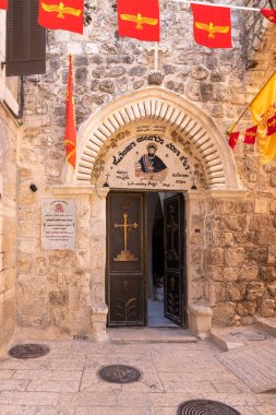 The main entrance to the small Armenian St. Marks Church in the Armenian quarter in the old city of Jerusalem, Israel clipart