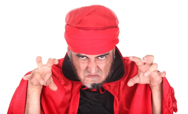 Hypnotist or sorcerer is doing hypnosis or magic with eyes and hands — Stock Photo, Image