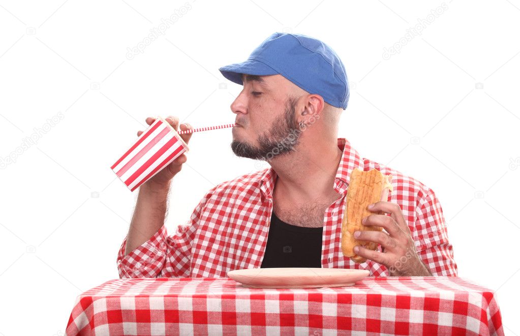 Man is eating and drinking