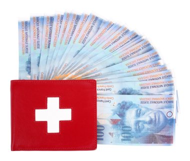 İsviçre bayrağı ile İsviçre Frankı banknot ve kırmızı cüzdan