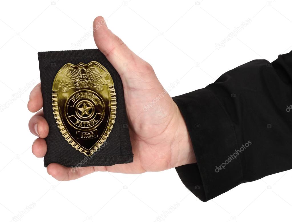 Man hand is holding special police badge