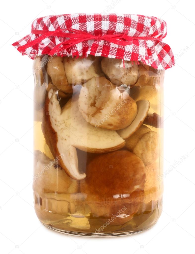 Boletus edulis porcini mushrooms preserved in jar