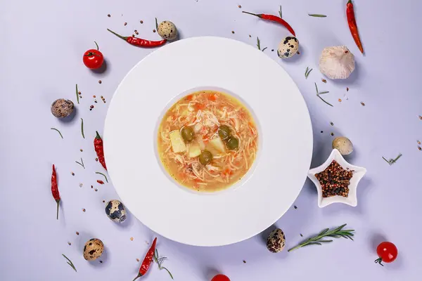 Chicken soup with vegetables, spices and quail eggs. Food still life — Stock Image Chicken Soup Vegetables Spices Quail Eggs Food Still Life Royalty Free Stock Images