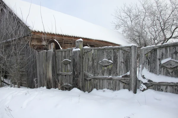 Le village en hiver Image En Vente