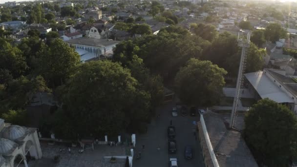 The suns rays fall on the old city quarter — Stock Video