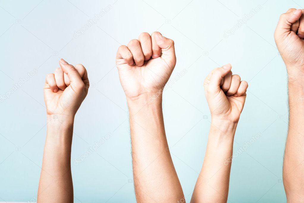 Success. Group of people arms wielding the hand on blue background