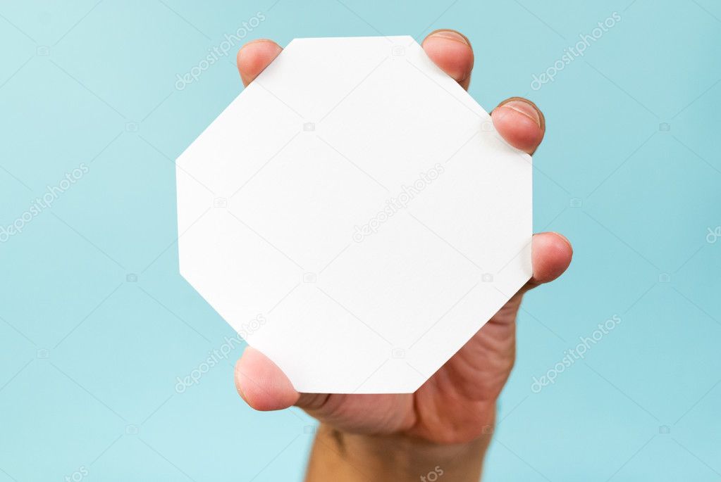 Octagonal stop on blue background