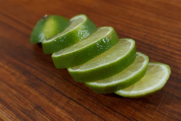 Sliced lime on a cutting board Food — Stock Photo, Image