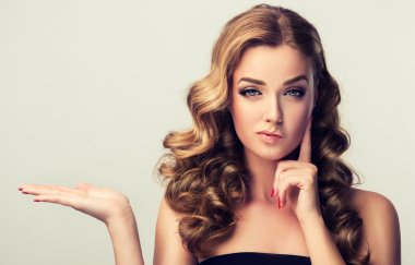 Model girl with wavy hair and  make up