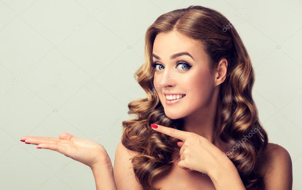 Model Girl With Wavy Hair And Make Up Stock Photo