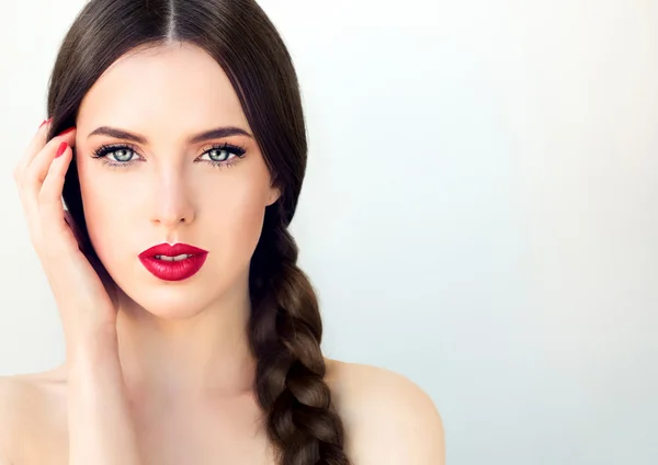 Young beautiful woman with braid — Stock Photo, Image