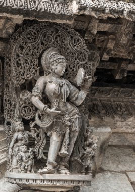 Beautiful sculpture in Chennakeshava Temple in Belur, Karnataka, India clipart