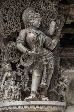Beautiful sculpture in Chennakeshava Temple in Belur, Karnataka, India clipart