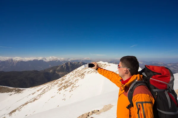 Winter hiking in the mountains. Stock Photo