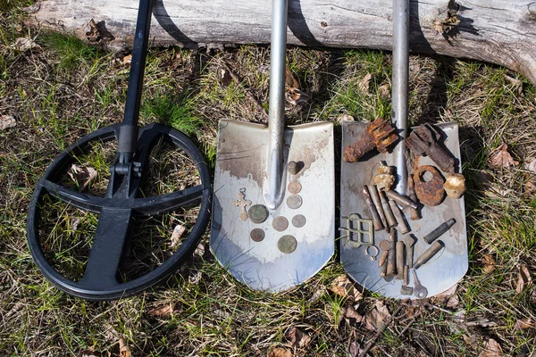 Search for coins with metal detectors and shovels. Royalty Free Stock Images