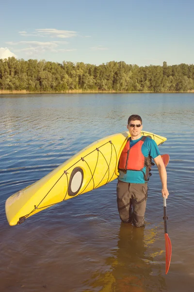 Man traveling on the river in a kayak — Stock Photo, Image