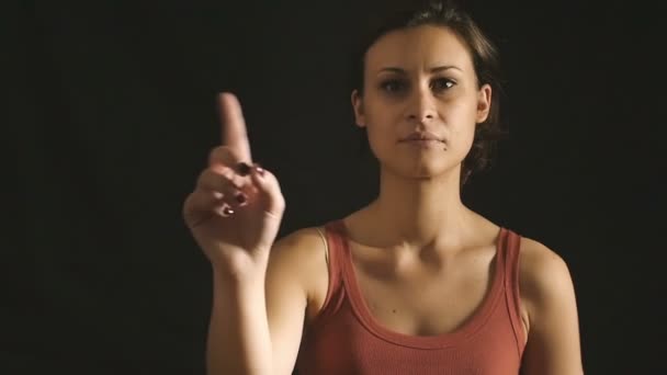 Young girl making signs of disapproval and denial: saying no with finger — Stock Video