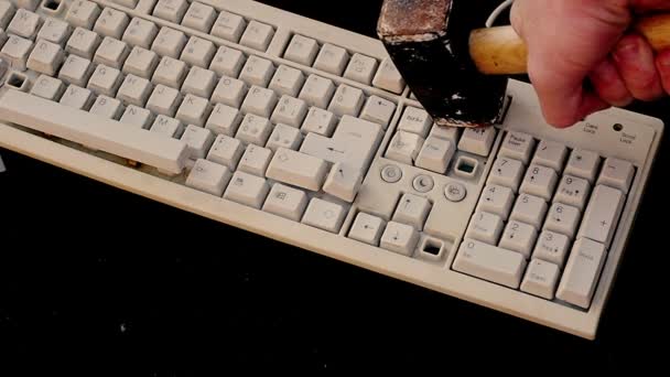 Man destroying keyboard — Stock Video