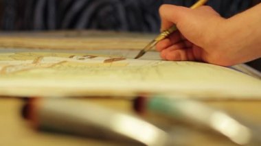 Profesyonel sanatçı manzara üzerinde çalışma