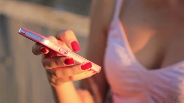 Young girl using smartphone — Stock Video