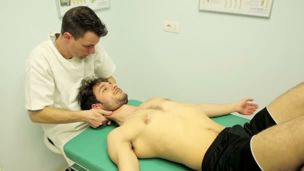 Relaxing Massage Chiropractor Neck Young Patient — стоковое видео