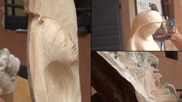 Beeldhouwer werken op een houten standbeeld — Stockvideo