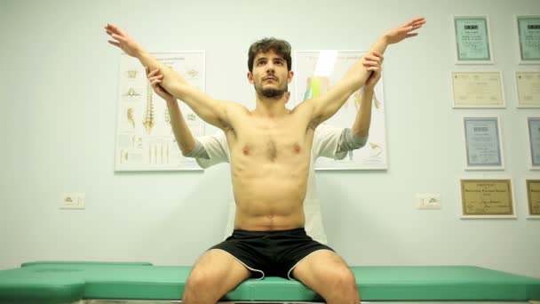 Shoulder Joints Checking Young Patient — Vídeos de Stock