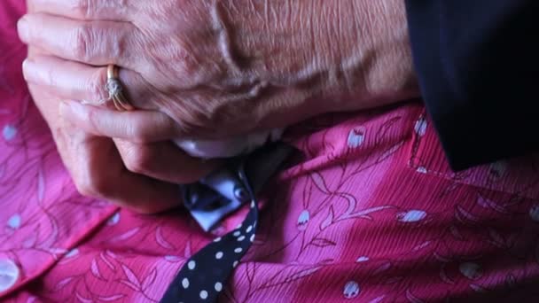 A pair of old hands clasped together — Stock Video