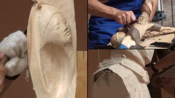 Sculptor working on a wooden statue — Stock Video