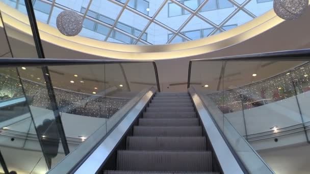 Escalators in a mall : rising the escalator steady shot — Video