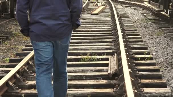 Walking on the railway — Stock Video