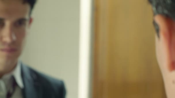 Proud businessman adjusts his tie and is full of enthusiasm — Stock Video