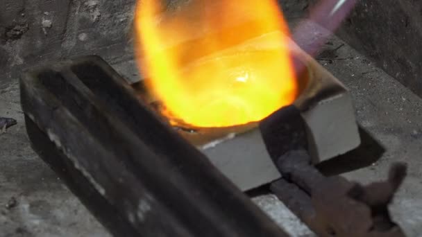 Goldsmith melting a silver piece — Stock Video