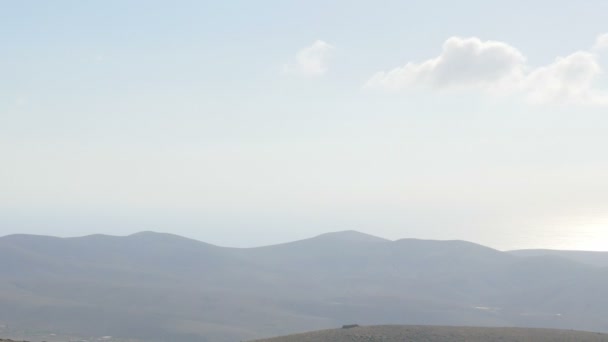 Subjective camera of the contrast between clouds and mountains — Αρχείο Βίντεο