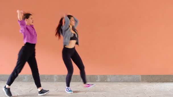 Young Women Practice Rehearsing Synchronized Dance Choreography — Stock Video