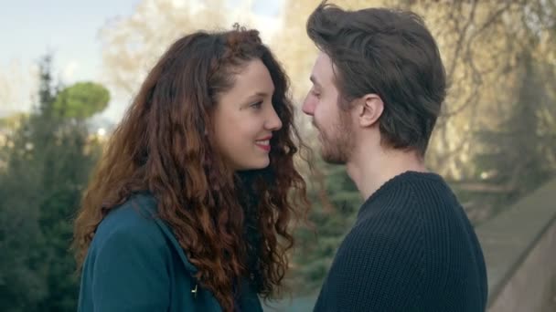 Fall in love, first kiss, loving couple kissing for the first time — Αρχείο Βίντεο