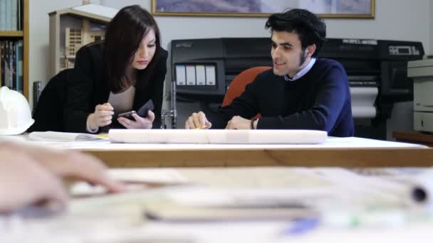 Architect teamwork: designers working on blueprints — Stock Video