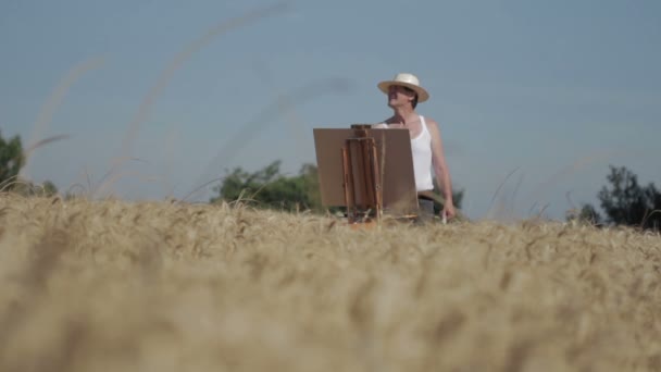 Peintre dans paysage rural : champ, champ de maïs, vieux, huile, pinceau — Video