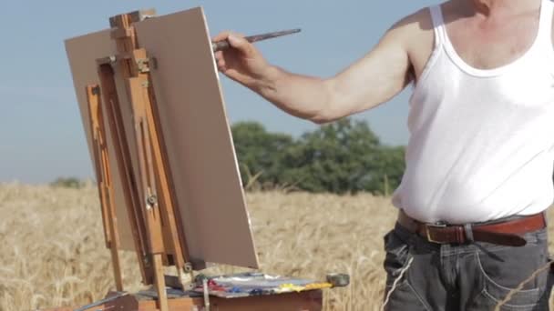 Сковорідка від художника до вух пшениці — стокове відео