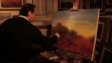 Ressam boyalar bir manzara resmi